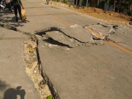 Shifted pavement on a highway after a 7.2 magnitude quake hit the central Philippine island of Bohol on October 15 with a death toll of 185. [photo by Moises Musico, ADRA-Philippines]