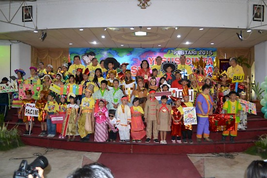 Children in west Java, Indonesia celebrate Christ's love during the Children%u2019s Spiritual Celebration at the Indonesian Adventist University on August 9. They represent the different countries of the world in their colorful international costumes. [photo courtesy of WIUM]